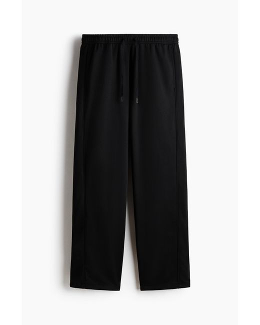 H&M Sport-Joggpants mit DryMove in Relaxed Fit in Black für Herren