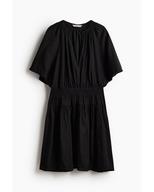 H&M Black Gesmoktes Kleid