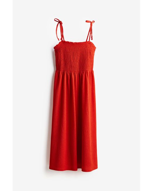 H&M Red Gesmoktes Kleid mit Bindeträgern