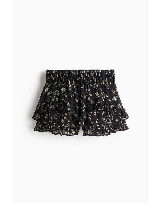 H&M Black Skort aus Plumetis mit Volantbesatz