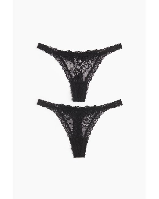 Lot de 2 strings Tanga en dentelle H&M en coloris Black