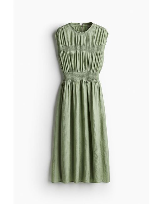 H&M Green Gesmoktes Kleid