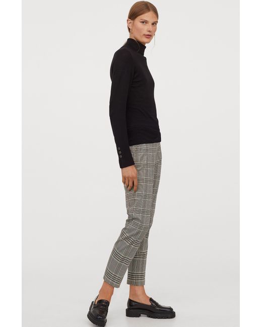 black fine knit polo neck