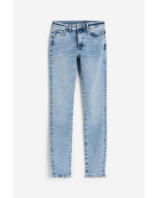 H&M Shaping Skinny Regular Jeans in het Blauw | Lyst NL
