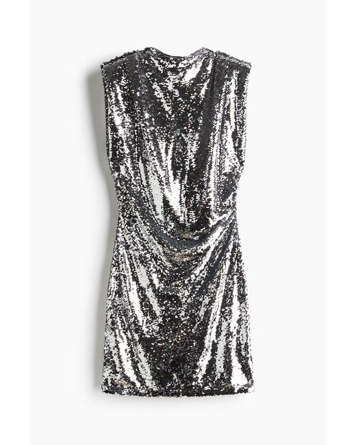 H&M Jurk Met Pailletten En Schoudervullingen in het Black