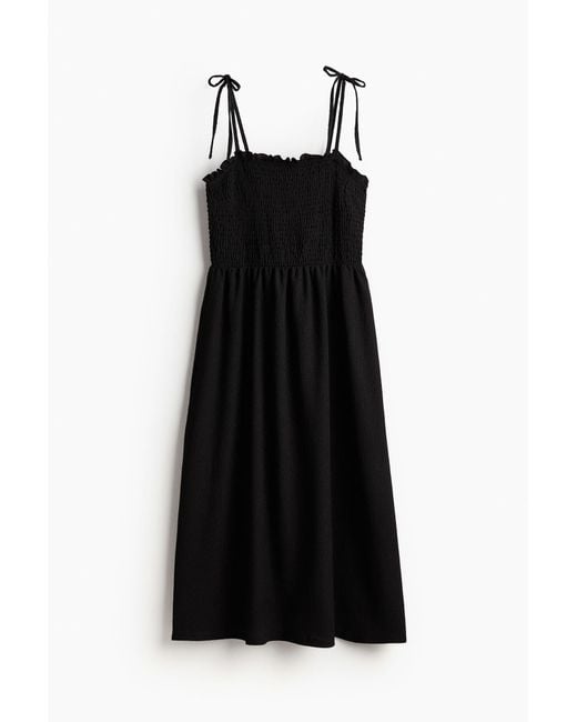 H&M Black Gesmoktes Kleid mit Bindeträgern