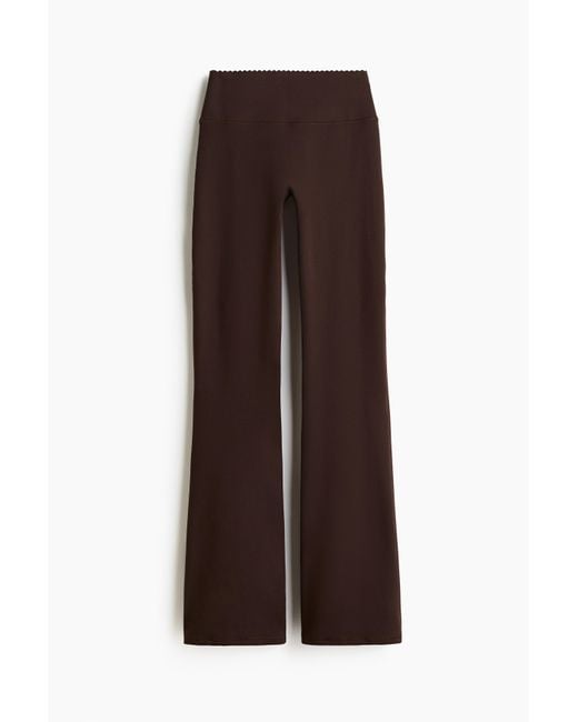 H&M Brown Ausgestellte Sportleggings mit SoftMove