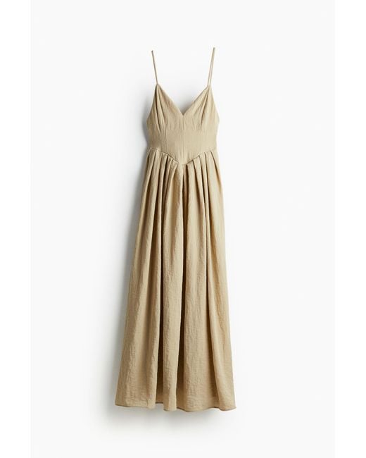 H&M Metallic Gecrinkeltes Kleid mit Faltenjupe