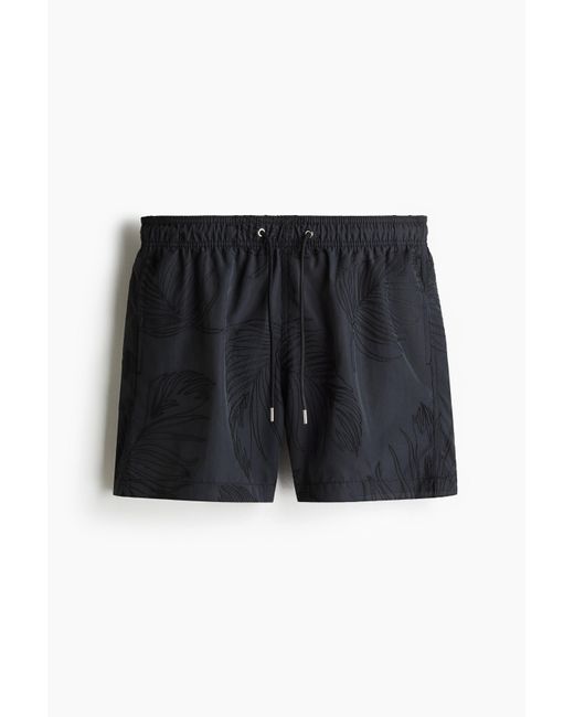 H&M Gemusterte Badeshorts in Black für Herren