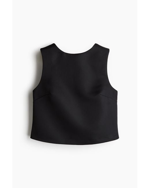 H&M Black Top mit tiefem Rückenausschnitt und Schleife