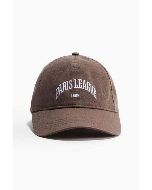 H&M Brown Baumwollcap mit Motiv