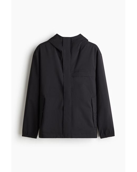 H&M Regenjacke mit StormMoveTM in Regular Fit in Schwarz für