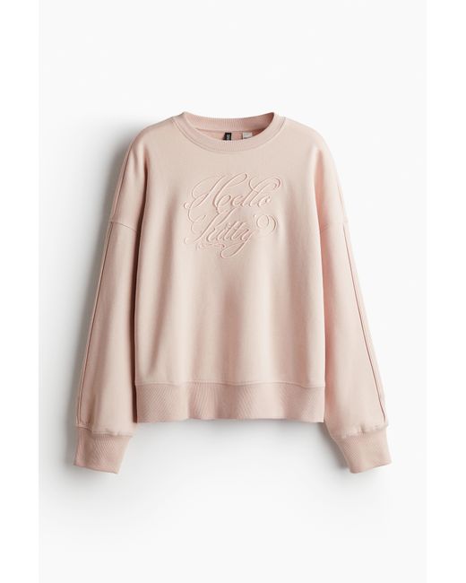 H&M Pink Oversized Sweatshirt mit Print