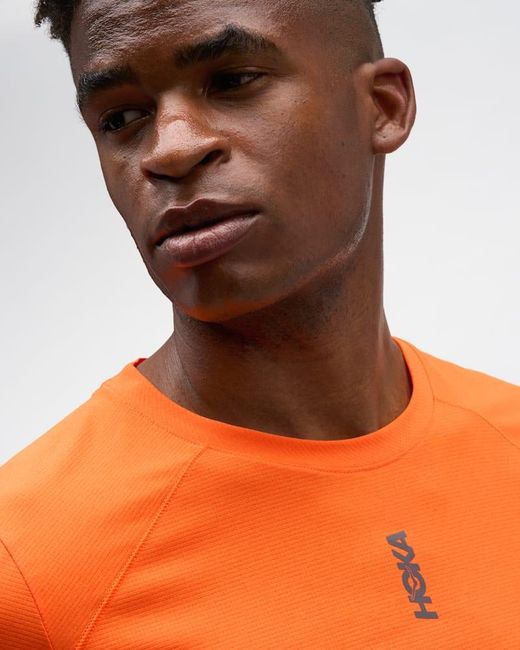 Hoka One One Orange Everyrun Short Sleeve Top for men