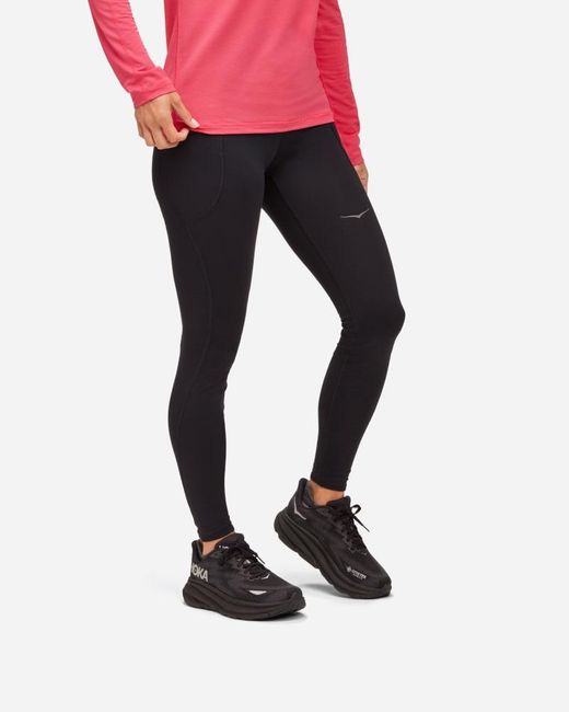 Hoka One One Red ColdSnap Lauftights, 71 cm für Damen in Black Größe XS | Sporttights & Leggings