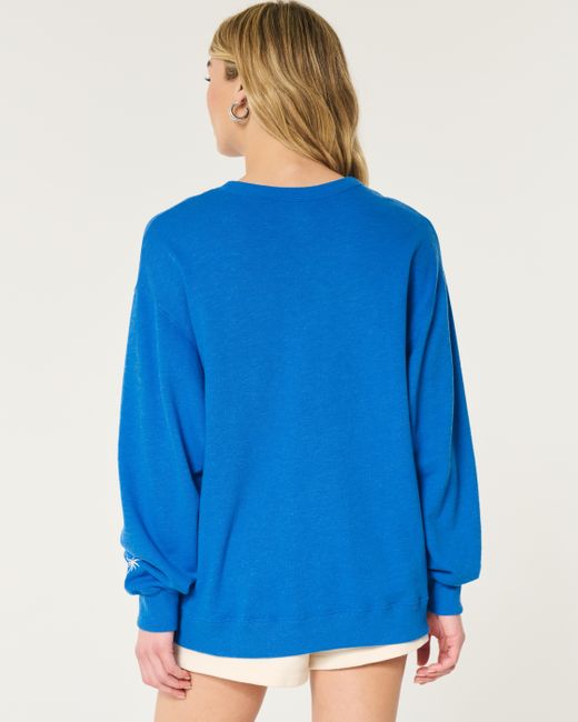 Hollister Blue Oversized-Sweatshirt aus Frottee mit Blumengrafik