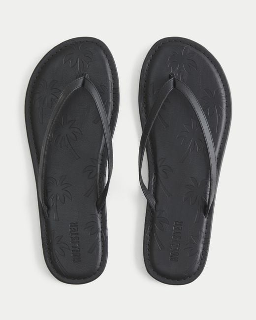 Hollister Black Palm Tree Pattern Flip Flops