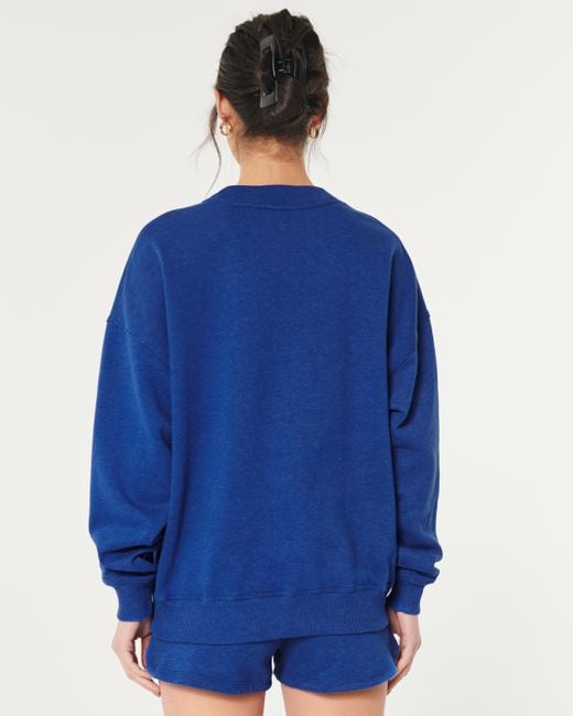 Hollister Blue Gilly Hicks Smile Series Sweatshirt in Oversized Fit mit Rundhalsausschnitt