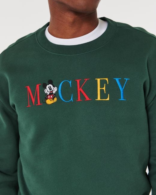 Hollister Lässiges Sweatshirt mit Rundhalsausschnitt und Micky Maus-Grafik in Green für Herren