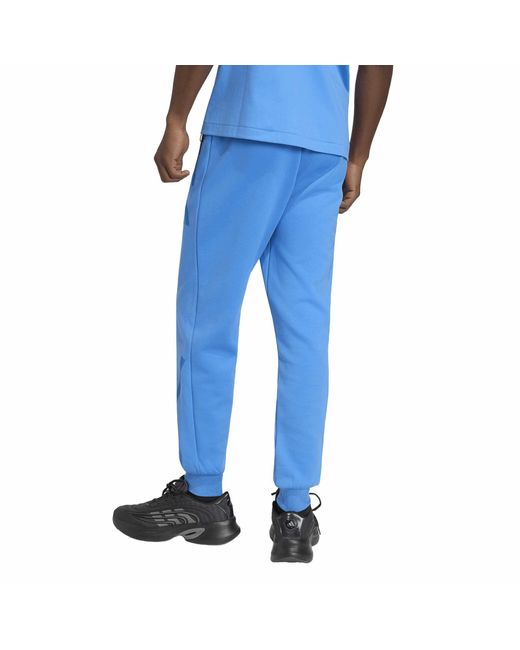 Adidas Blue Z.N.E. Tapered-Fit Tracksuit Bottoms for men