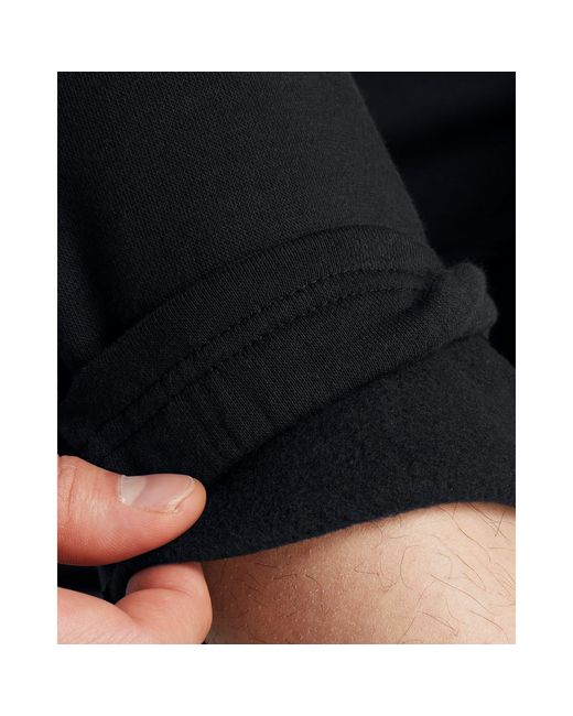 Under Armour Blue Icon Taping Closed Hem Fleece Joggers for men