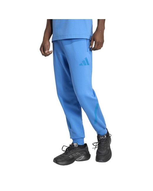 Adidas Blue Z.N.E. Tapered-Fit Tracksuit Bottoms for men