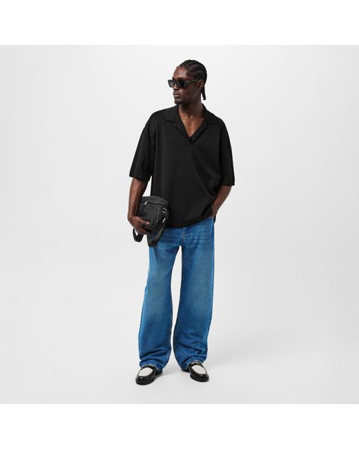 AMI Black Knitted Short-Sleeve Polo Shirt for men