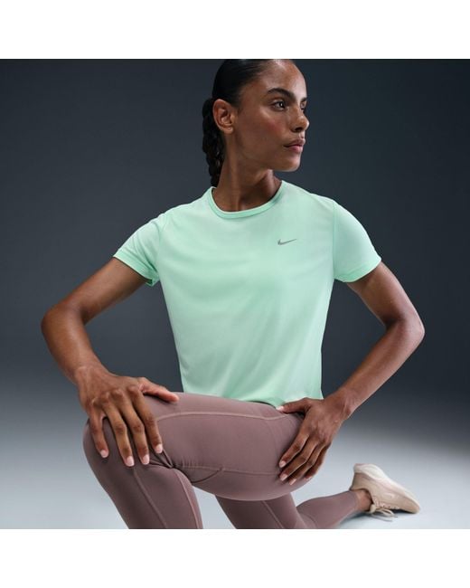 mint green nike running top