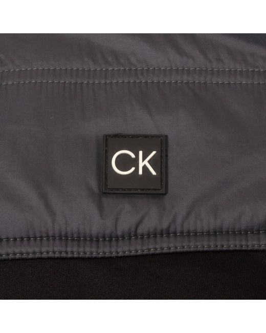 Calvin Klein Black Solid Patterned Full Zipper Ribbed Cuff Zipped Pocket Jacket for men