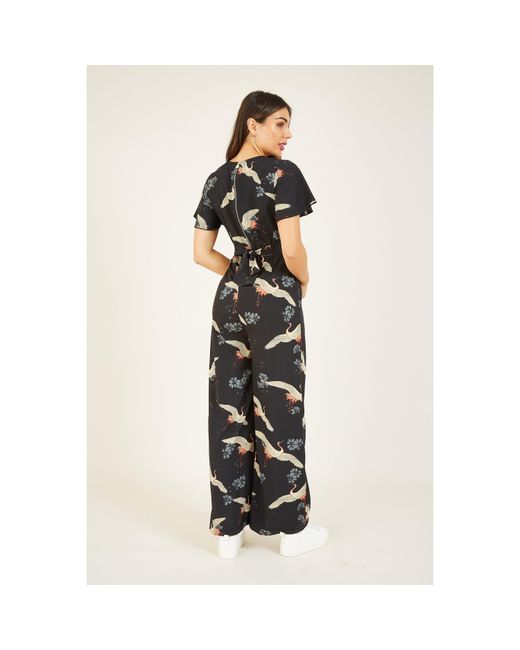 Yumi' White Crane Print Jumpsuit
