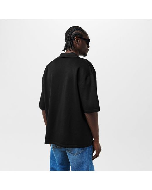 AMI Black Knitted Short-Sleeve Polo Shirt for men