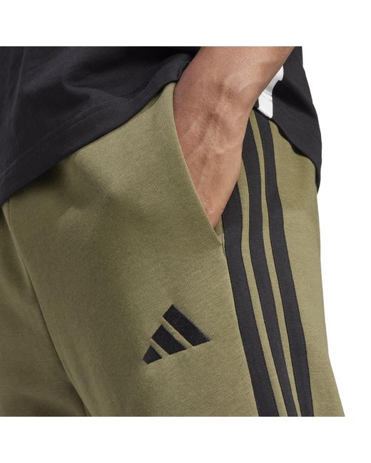 Adidas Green Essentials Fleece Tapered Cuff 3-Stripes Joggers for men