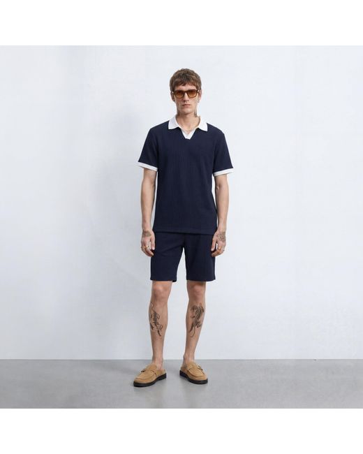 Twisted Tailor Blue Henry Textured Open Collar Polo for men