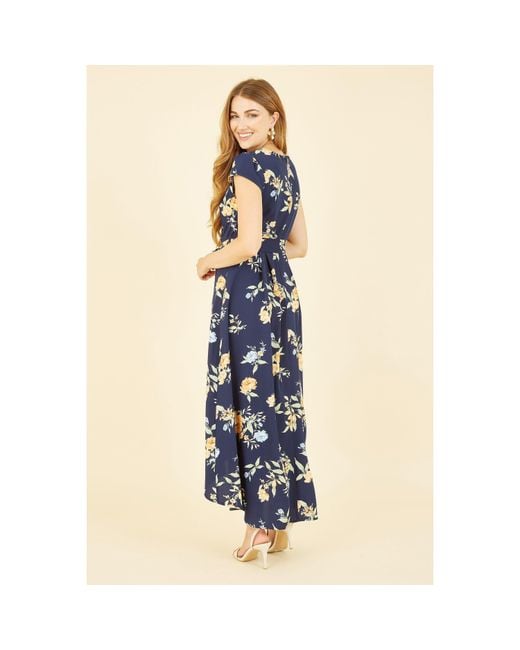 Mela London Blue Floral Print Dipped Hem Wrap Dress