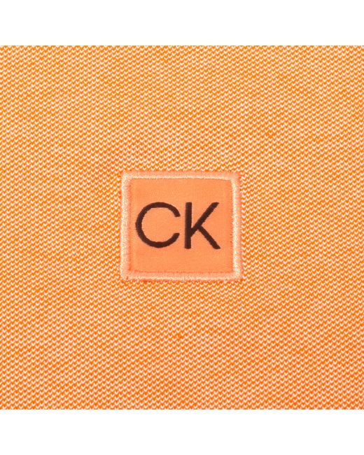 Calvin Klein Orange Short-Sleeve Performance Polo Shirt for men