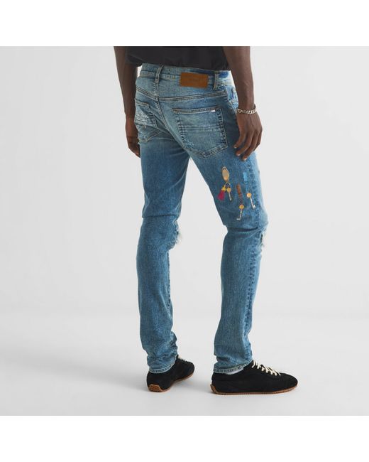 Amiri Blue Skinny Jeans for men