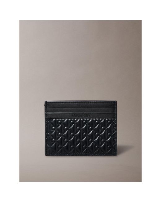 Calvin Klein Black Embossed Emblem Leather Card Holder for men
