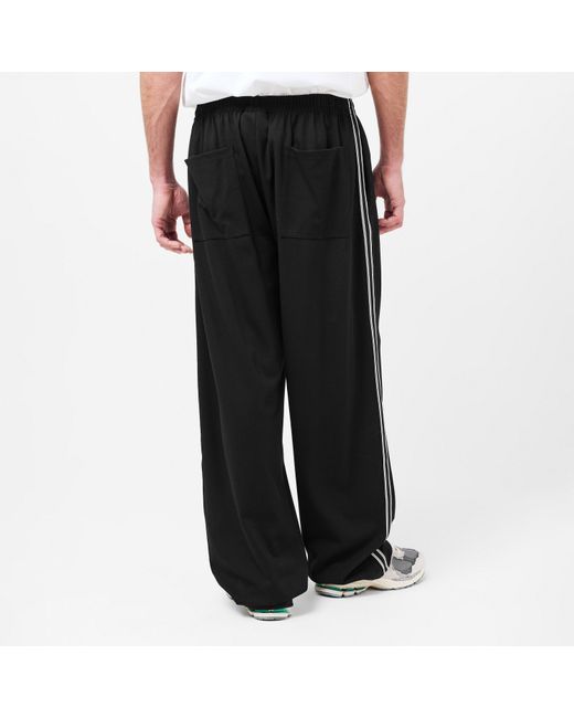 MKI Miyuki-Zoku Black Wide Fit Open Hem Woven Tracksuit Joggers for men