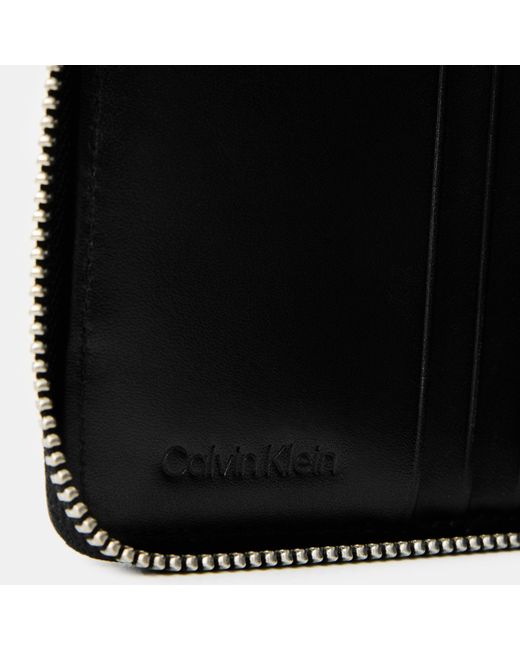 Calvin Klein Black Embossed Woven Billfold Wallet for men