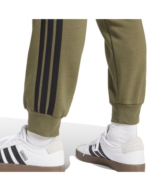 Adidas Green Essentials Fleece Tapered Cuff 3-Stripes Joggers for men