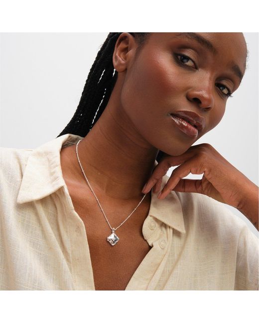 Inicio White Sterling Plated Clover Locket