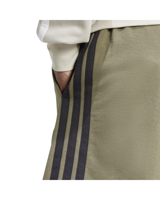 Adidas Green Essentials 3 Stripe Fleece Shorts for men