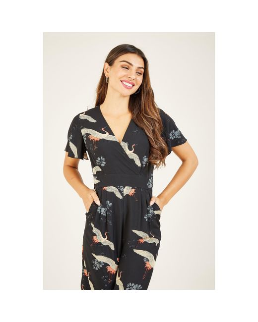 Yumi' White Crane Print Jumpsuit