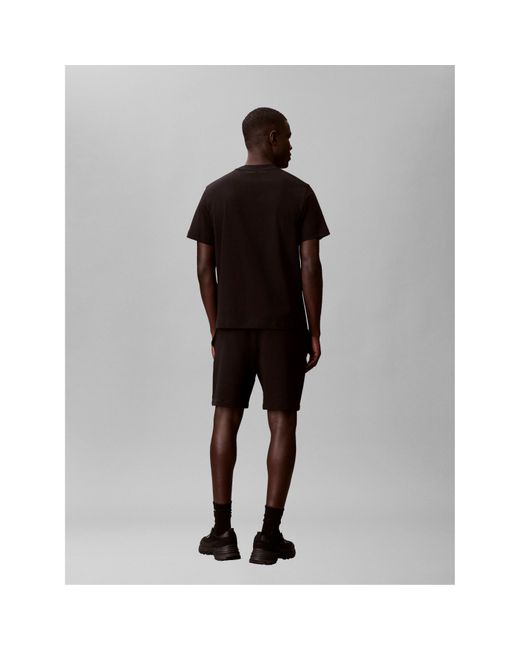 Calvin Klein Black Woven Badge Fleece Jogger Shorts for men
