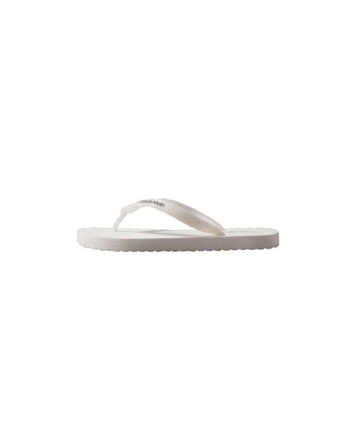 Calvin Klein White Flip Flops