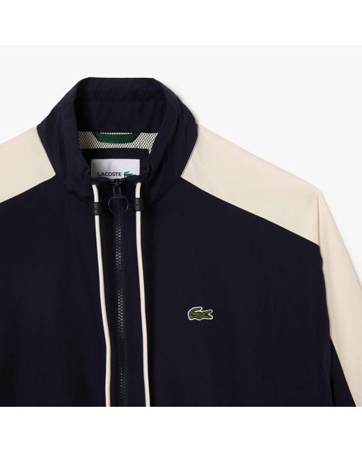 Lacoste Blue Showerproof Colour Block Track Jacket for men
