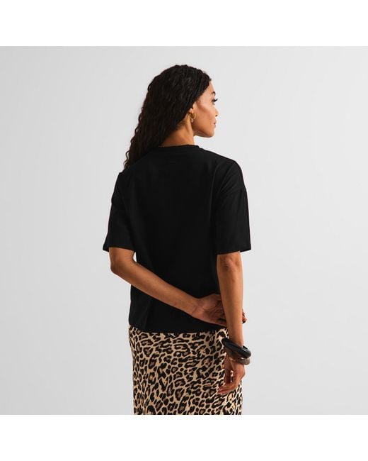 Never Fully Dressed Black Running Wild T-shirt