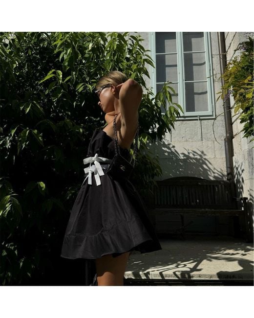 Collective The Label Green Sleeveless Bow Mini-Dress