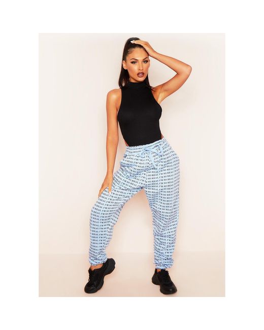 Missy Empire Blue I'M Real Slogan Joggers