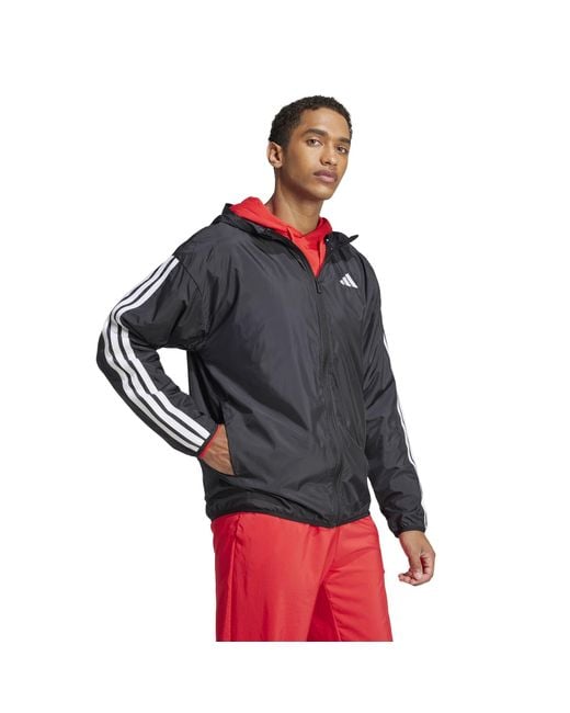 Adidas Black Essentials Stripes Lightweight Mesh Lined Windbreaker for men